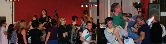 Blackjakk performs live whilst an audience member stage dives!