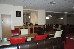 Photograph of the social club interior showing the lowered skittle alley area